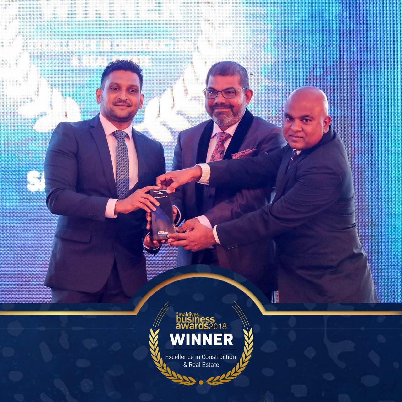 SASE receiving the Maldives Business Awards 2018 Excellence in Construction and Real Estate award